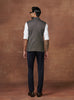 NOBLE NOIR WAISTCOAT WITH PLEATED PATCH POCKETS